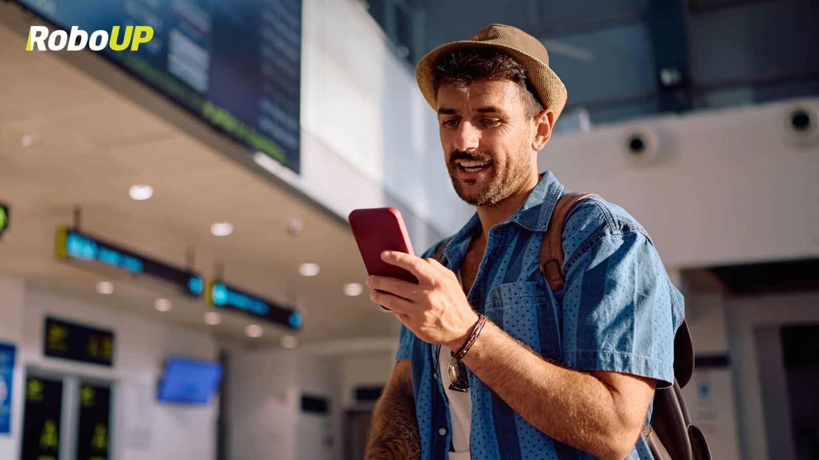 man-using-cell-phone-airport.jpg
