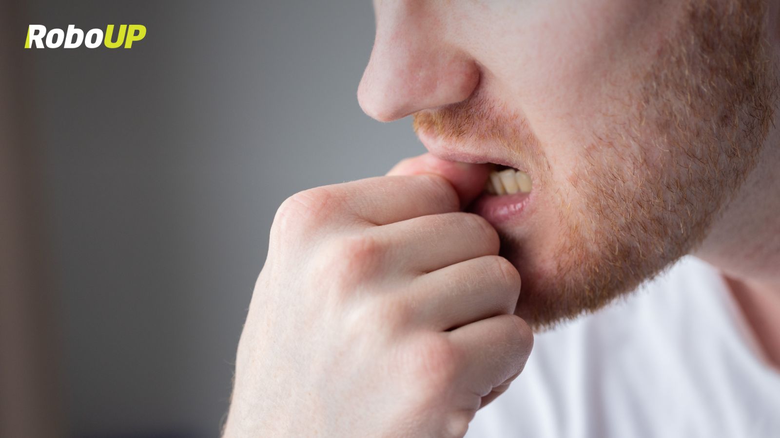 man-chewing-on-his-fingernails-worried.jpg
